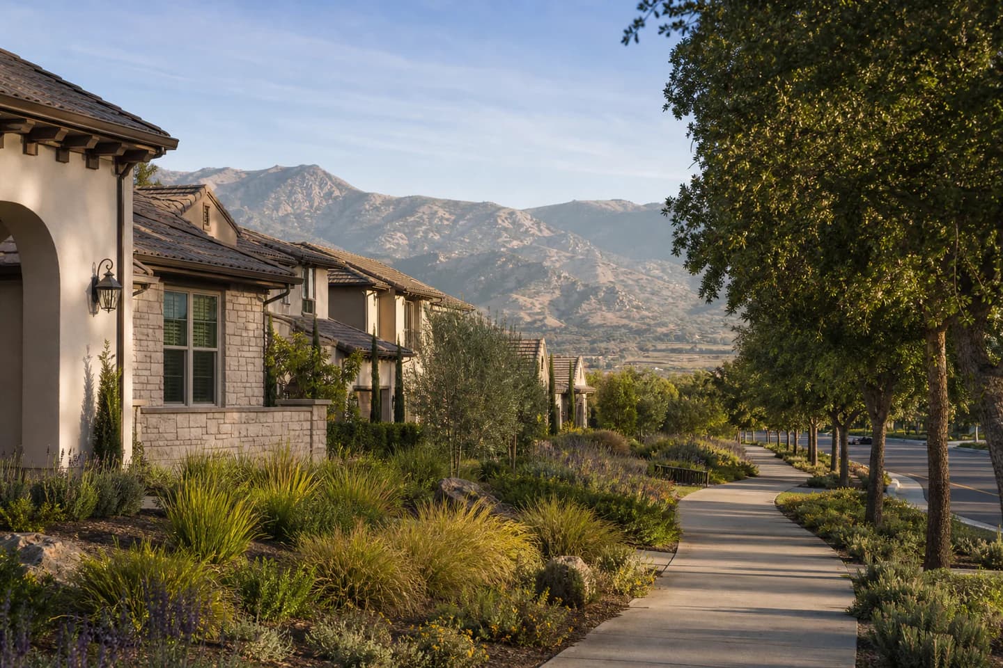 Editorial Fresno and Visalia residential context with landscaped paths, newer homes, and inland terrain; not an exact property or listing
