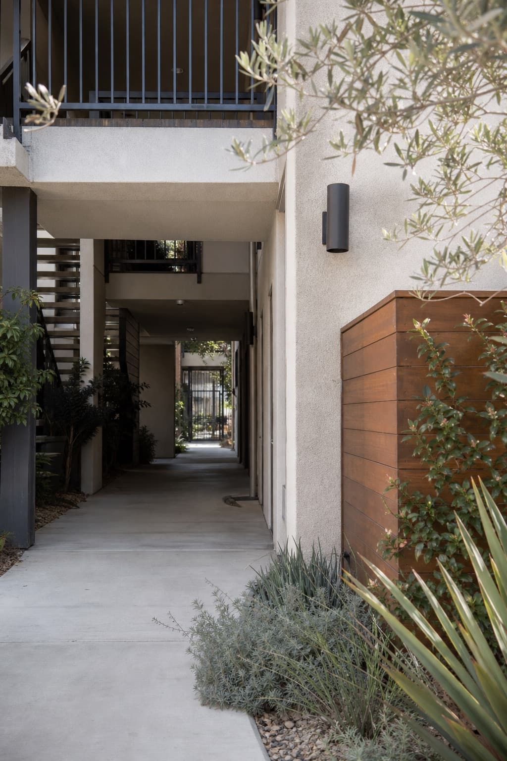 Maintained multifamily property walkway and landscaped common area